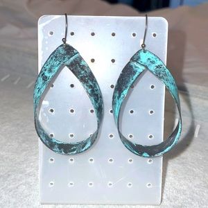Hammered iron bronze and turquoise ribbon teardrop shaped dangle earrings.